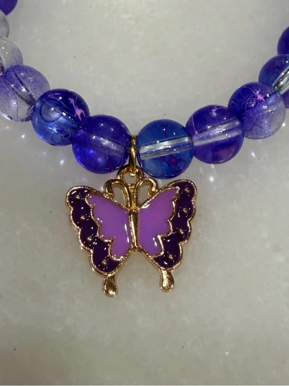 Purple Beaded Stretch Bracelet with Butterfly Charm